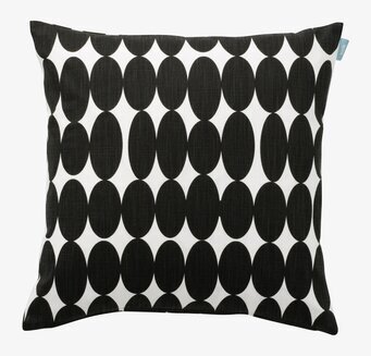 Foto av kuddfodral med stilrent geometriskt mönster