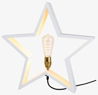 Bild av dekorativ vit ljusstjärna med varm belysning