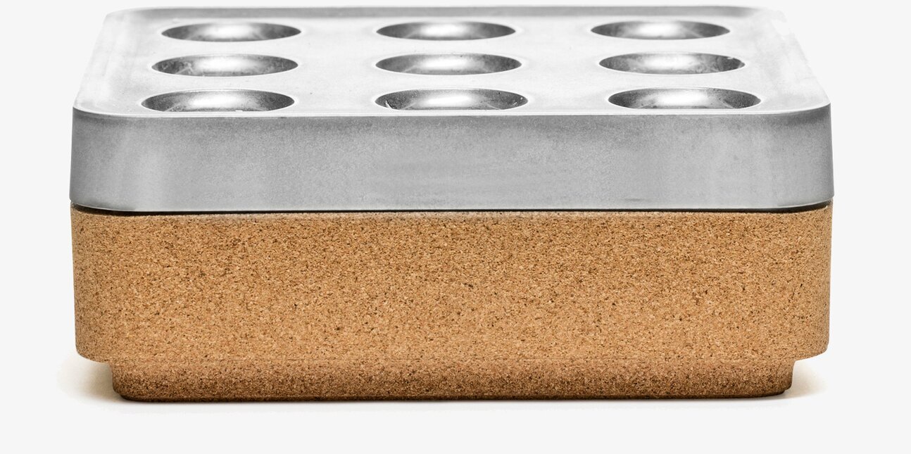 Bild av elegant och funktionell kork- och metallskål