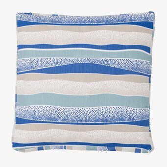 Bild av kvadratisk kudde med vågigt mönster i blått