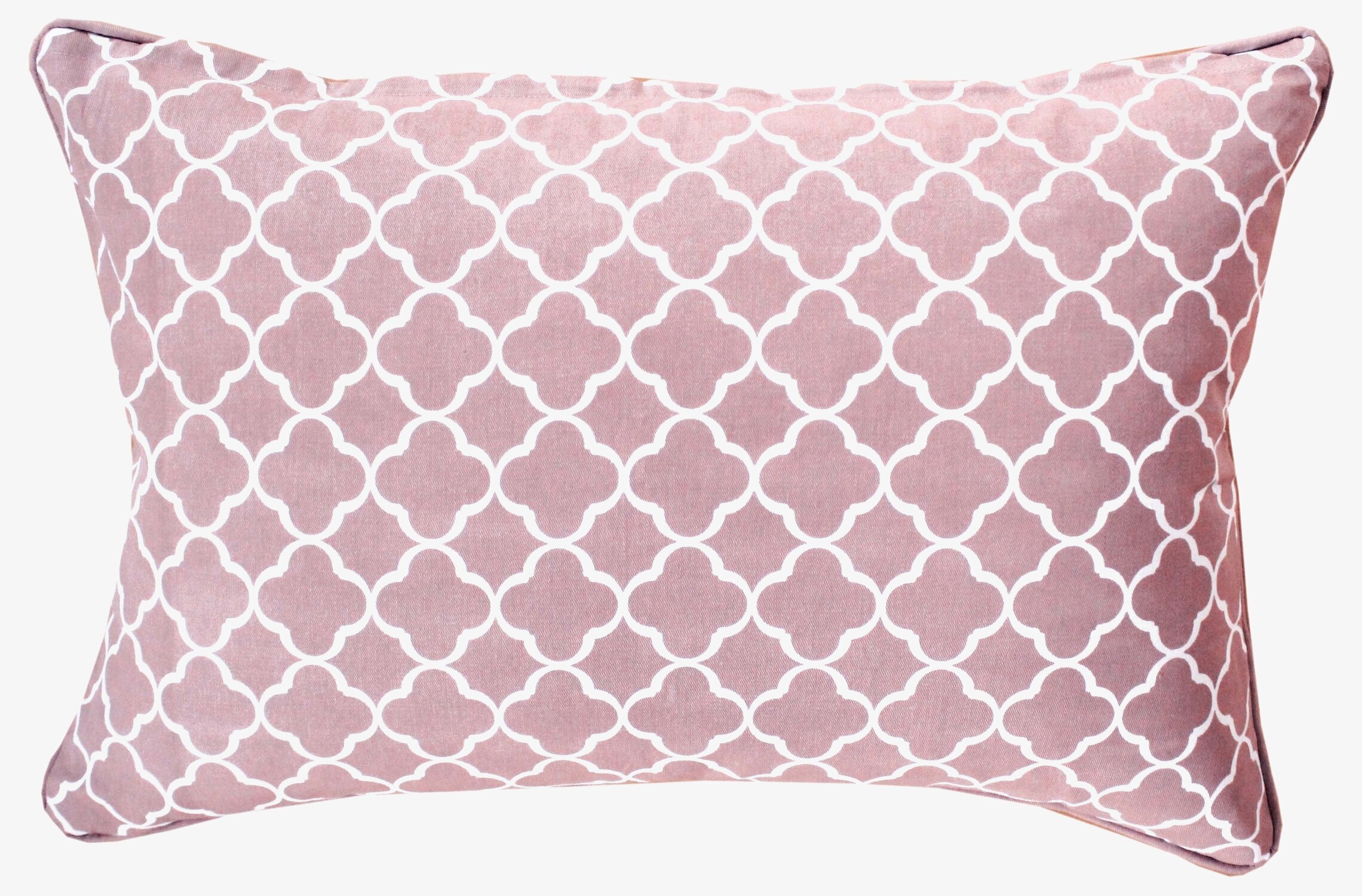 Bild av kuddfodral i dammig rosa med vita mönster