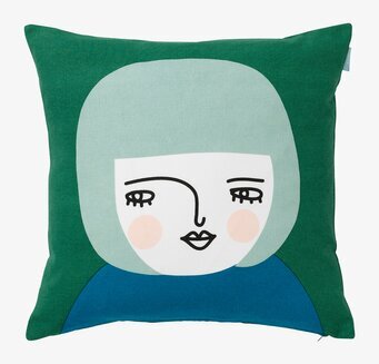 Bild av kuddfodral med grafisk ansiktsdesign i färg