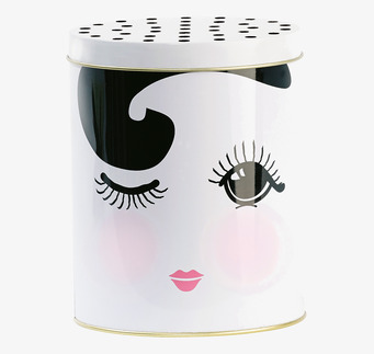 Bild av retro plåtburk med ansikte och prickigt lock