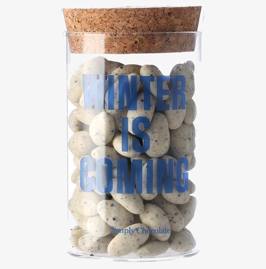 Bild av stilfull glasburk med lyxiga chokladpraliner