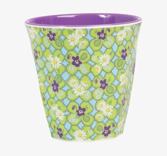 Bild av färgglad mugg med blommigt mönster och lila insida