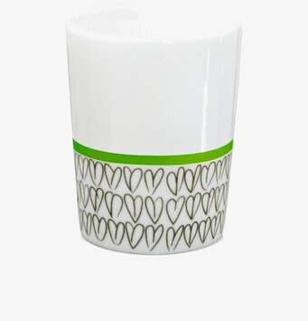 Foto av stilren äggkopp med hjärtmönster och grön detalj