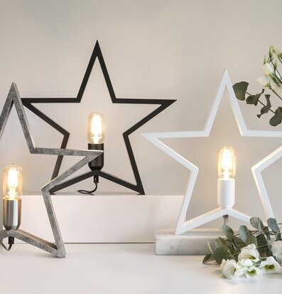 Foto av stilfullt arrangemang med dekorativa stjärnor