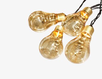Bild av LED-ljusslinga med glödlampor i varm guldfärg