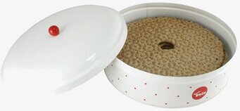 Bild av rund plåtburk för knäckebröd med röd-vit design