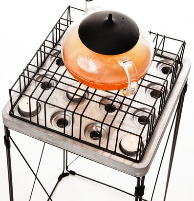 Bild av innovativ produkt för värmeljus och drycker