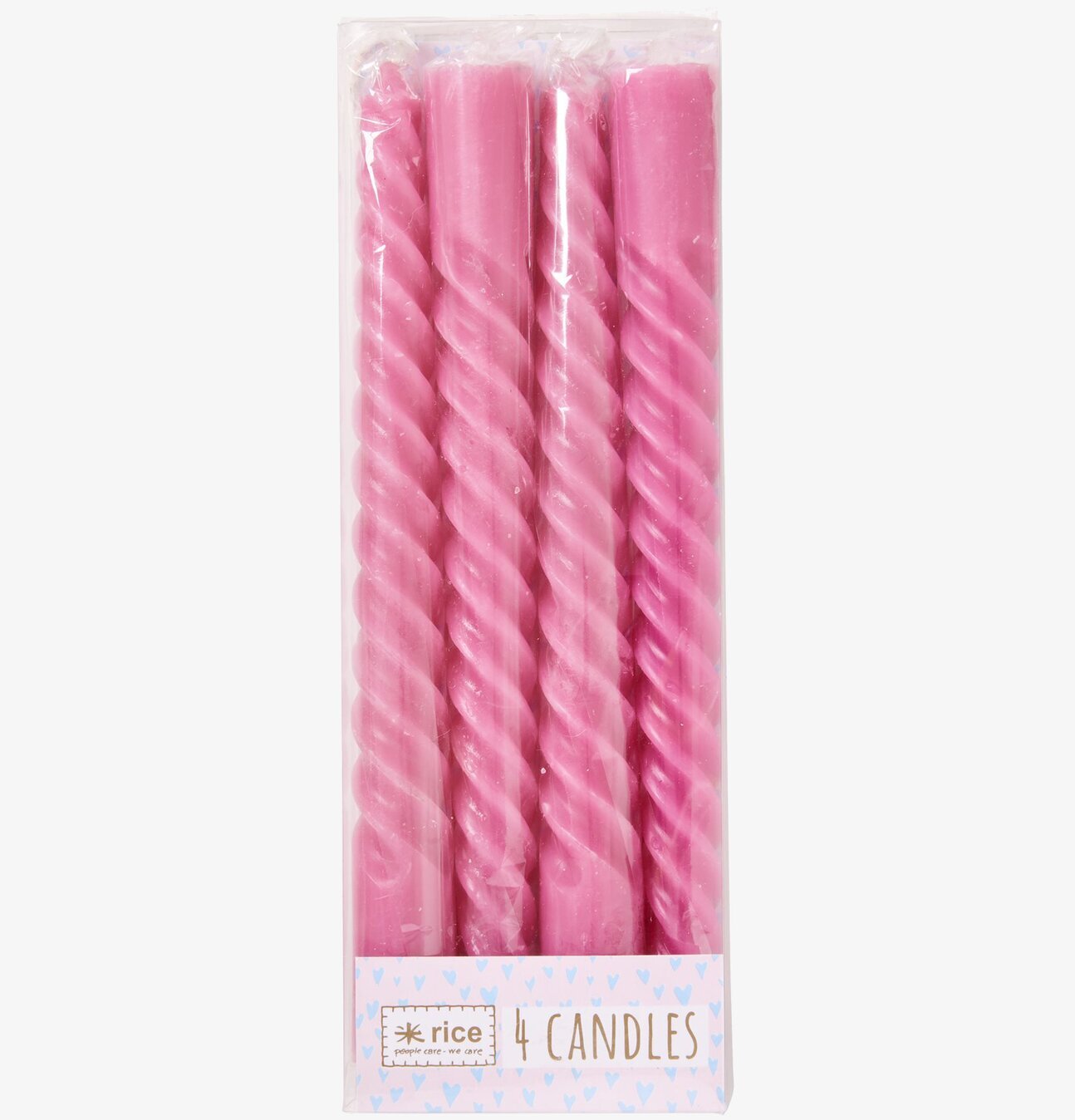 Bild av spiralformade stearinljus i mjuk lila ton