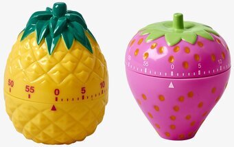 Bild av lekfulla och färgglada kökstimers i fruktform