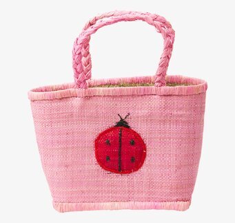 Bild av färgglad shoppingväska med nyckelpiga-design