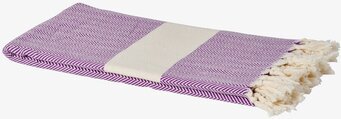 Bild av lila handduk med zickzack-mönster och fransar
