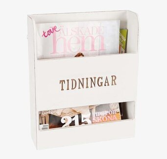 Bild av stilrent vitt tidningsställ med två fack