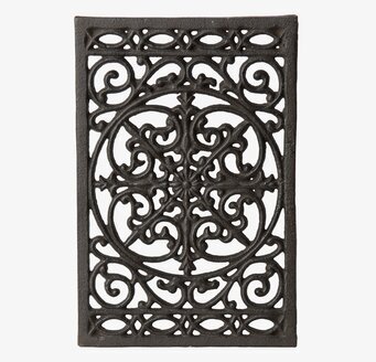 Foto av dekorativt och funktionellt grytunderlägg