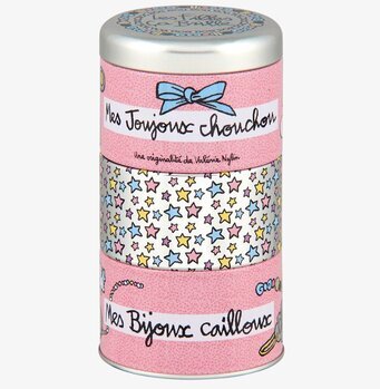 Bild av en charmig och färgglad plåtburk för förvaring