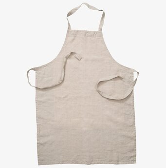 Foto av stilrent linneförkläde i naturlig beige ton