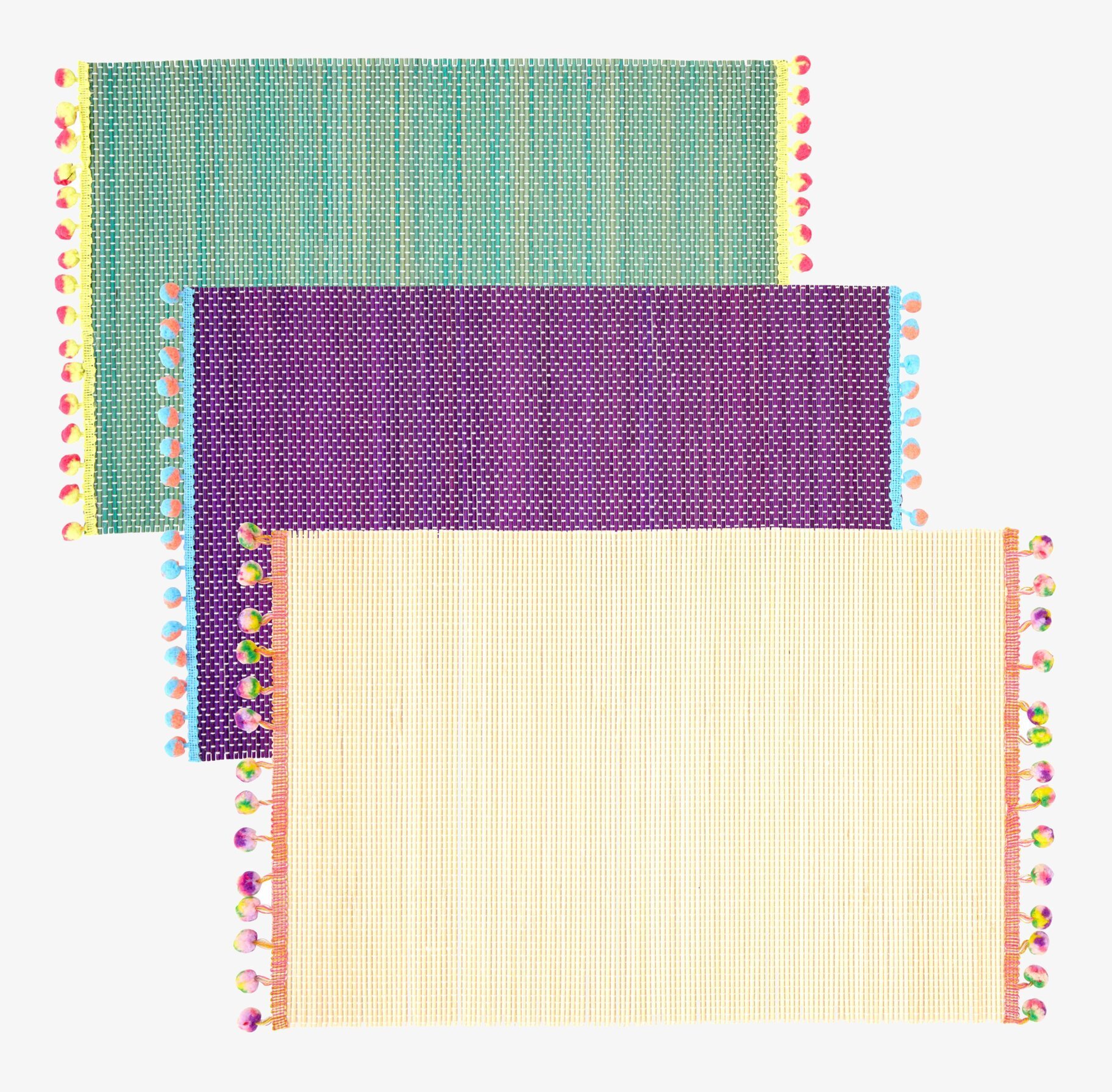 Bild av färgglada bordsunderlägg med pom-poms