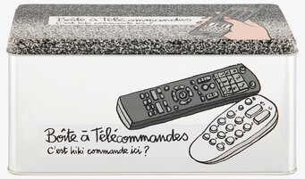 Bild av stilren plåtburk för fjärrkontrollförvaring