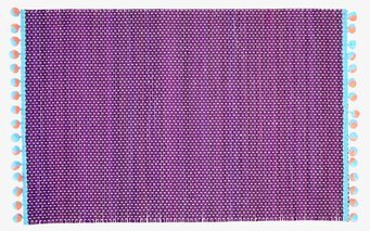 Bild av bordsunderlägg med livfull design och färg