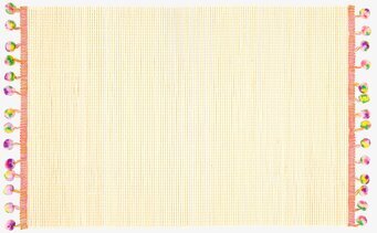 Bild av färgglatt bordsunderlägg med pompom-detaljer