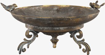 Bild av rustikt fågelbad i guld/brun färgkombination