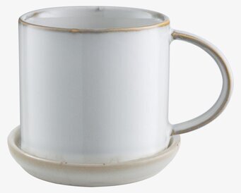 Bild av stilren kaffekopp i vit keramik med fat