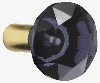 Bild av elegant glasknopp med gyllene metallfäste