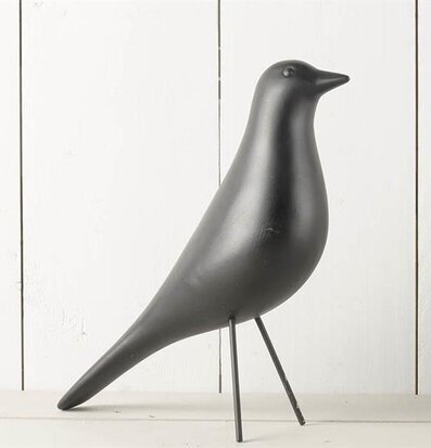 Foto av elegant och stilren dekorationsfågel i svart