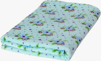 Bild av en vackert vikt badhandduk med blommönster