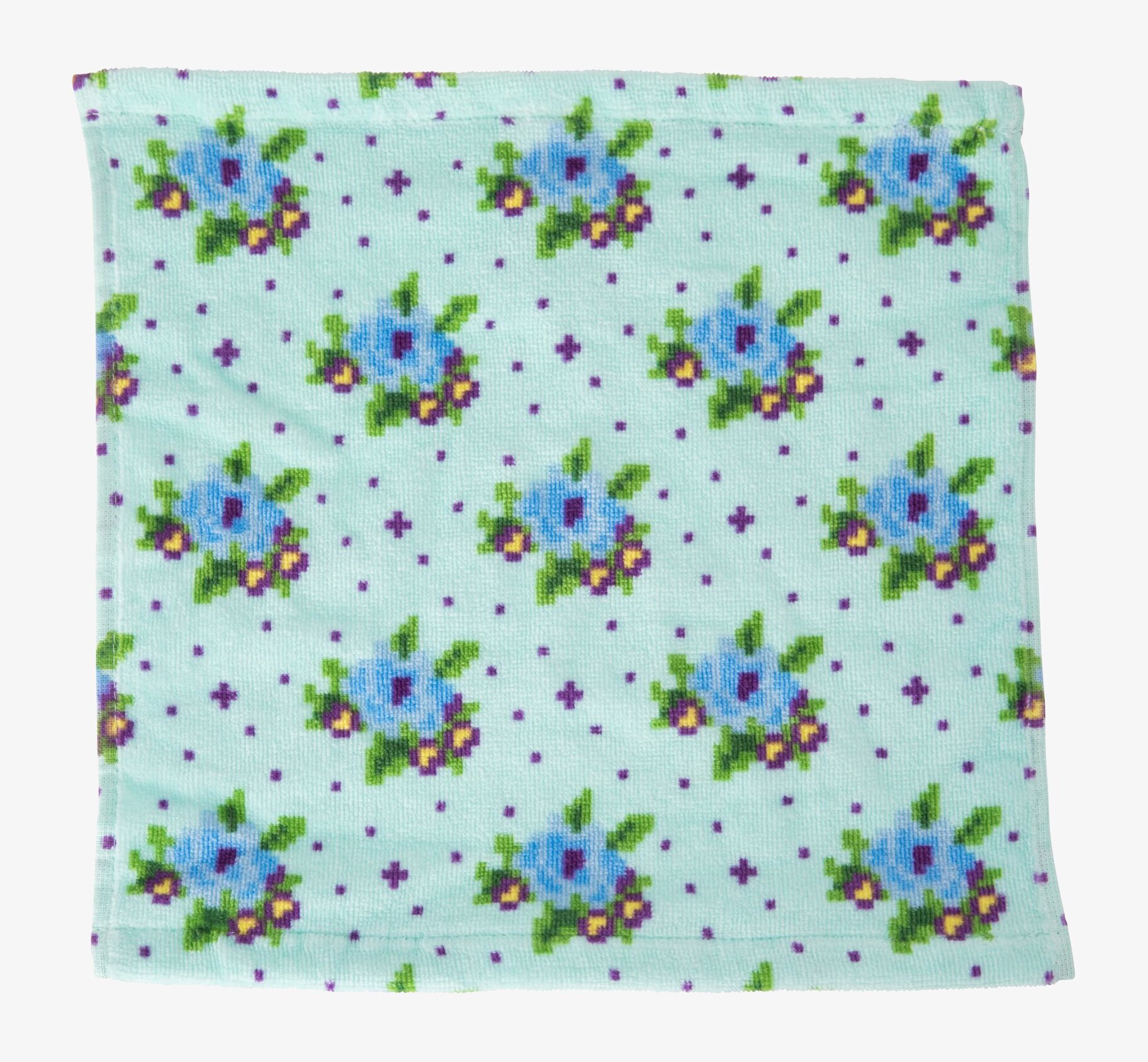 Bild av en blommig tvättlapp i mjukt, absorberande material