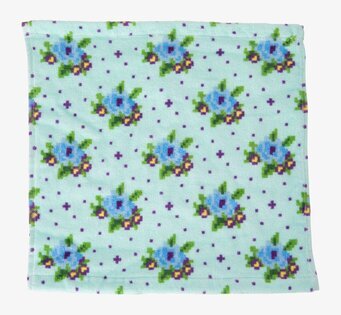 Bild av en blommig tvättlapp i mjukt, absorberande material