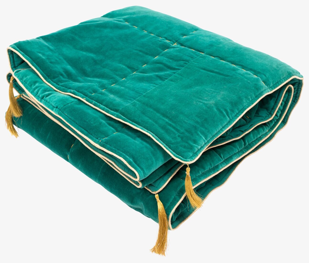 Bild av en lyxig grön sammetsfilt med gulddetaljer