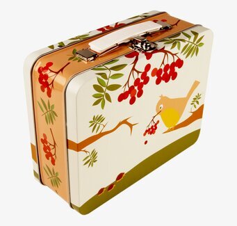 Bild av lunchbox med fågelmotiv och naturinspirerad design