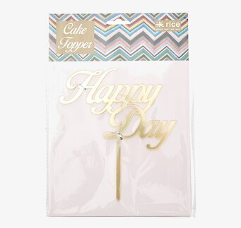 Bild av festlig tårtdekoration med gyllene text