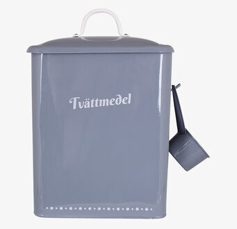 Foto av stilren blå plåtburk för tvättmedelsförvaring