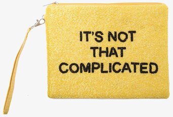 Bild av charmig gul väska med pärlor och text