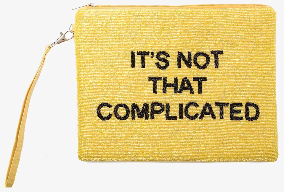 Bild av charmig gul väska med pärlor och text