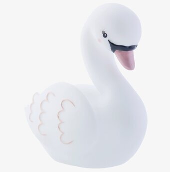 Foto av elegant svanformad nattlampa med mjukt ljus