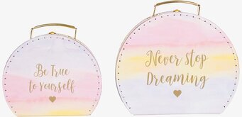 Bild av färgglada väskor med inspirerande budskap