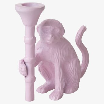 Bild av ljusstake i rosa med unik och färgglad design