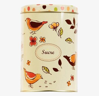 Bild av dekorativ plåtburk med naturinspirerat motiv