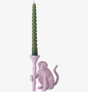 Bild av unik, rosa ljusstake med grön spiralformad ljus