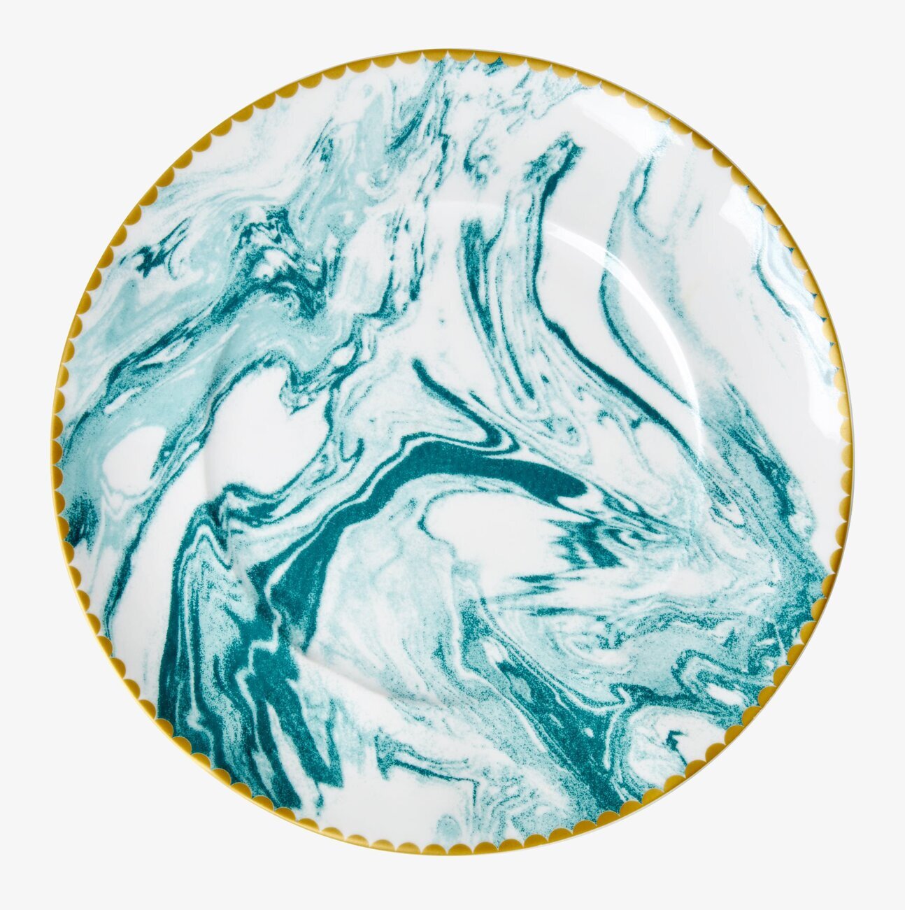 Bild av elegant tallrik med marmor- och gulddetaljer