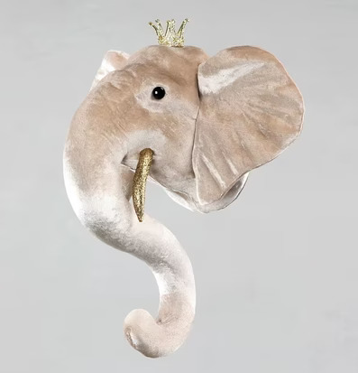 Bild av elegant plyschelefant med gyllene detaljer