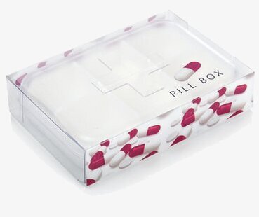 Bild av funktionell och stilren pillerask i vit plast