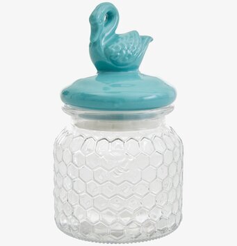 Bild av elegant glasburk med turkost lock och svan