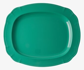 Bild av elegant grön serveringsbricka med detaljer