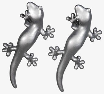 Bild av stilfulla geckoformade knoppar i silverfärg